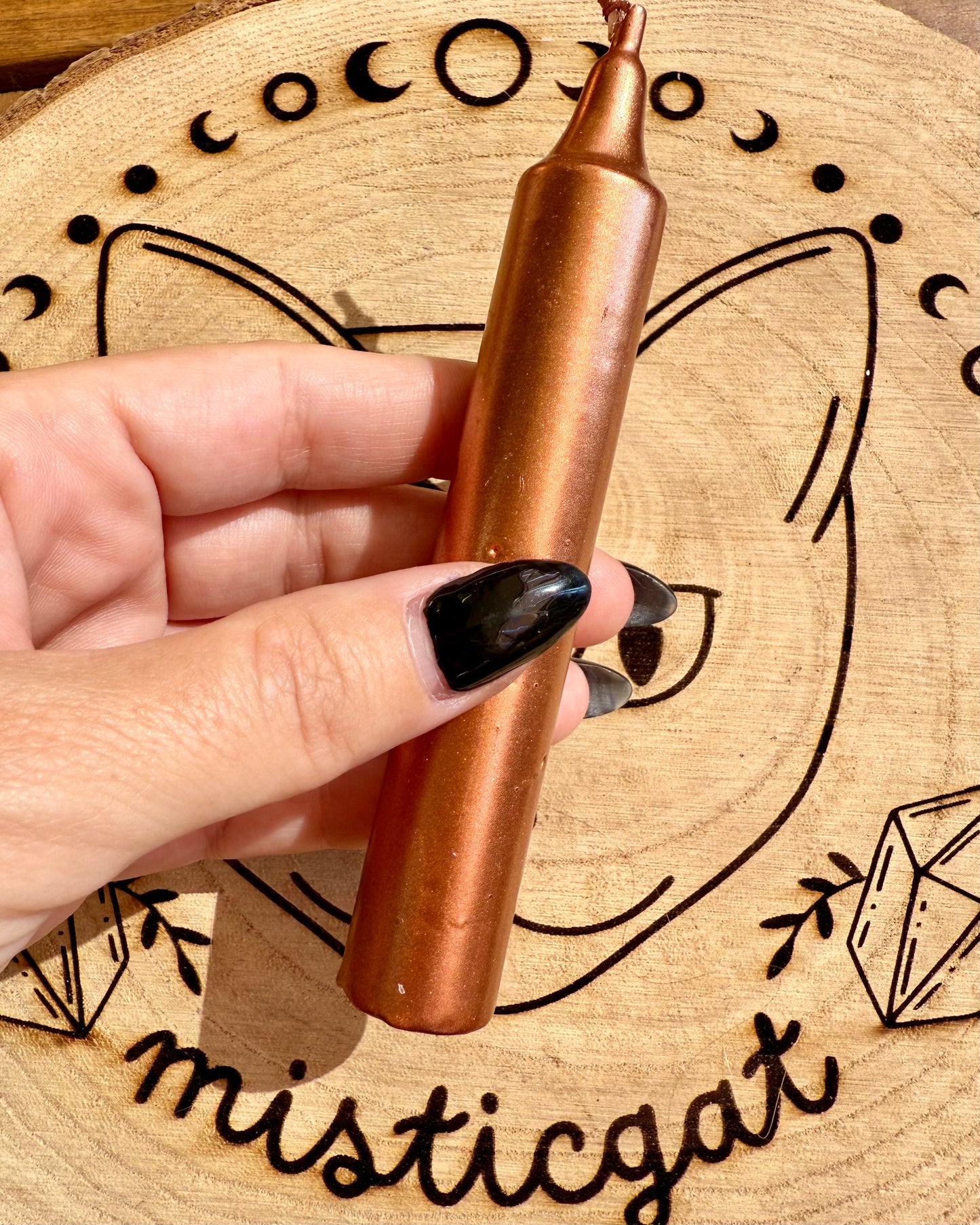 Vela Bronce | Estabilidad, fuerza y grounding.